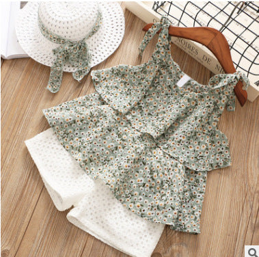 Two-piece suit of sling floral top and shorts