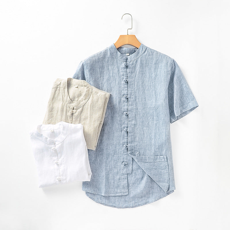Blue men's short-sleeved shirt with two folded shirts