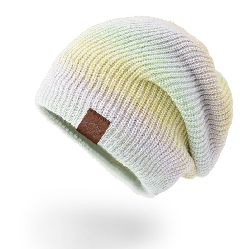 قبعة دافئة بألوان متدرجة 