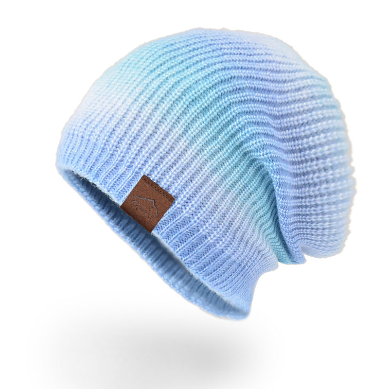 قبعة دافئة بألوان متدرجة 